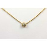 SOLITÄRANHÄNGER AN KETTE, 750/ooo Gelbgold, besetzt mit einem Brillantsolitär von ca. 1,20 ct.,