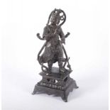 WÄCHTERFIGUR, Bronze, auf hohem, separaten Sockel stehende Gottheit, H 26, besch., rest. CHINA,