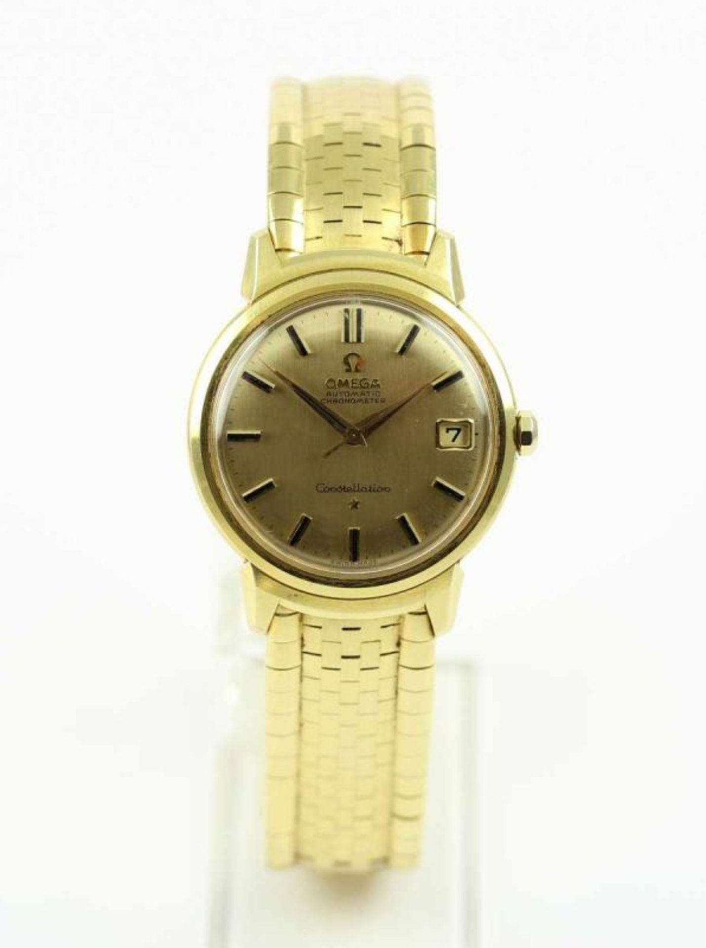 HERRENARMBANDUHR, 750/ooo Gelbgold, Marke: OMEGA, Modell: CONSTELLATION, goldene Strichindexe,