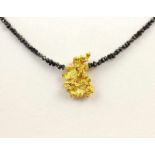 COLLIER, 750/ooo Gelbgold, schwarze Diamanten, mit zentralem Goldnugget 3,39g, L 40,5,