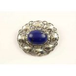 BROSCHE, 800/ooo Silber, besetzt mit einem Lapiscabochon, L 5,3, 19,8g, um 1930 22.00 % buyer's