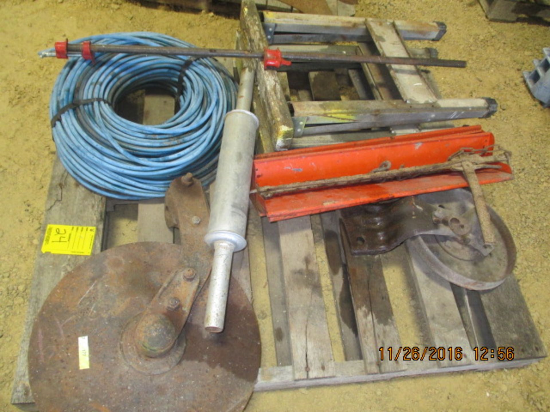 Pallet w/muffler, disc blade, saw horses, misc