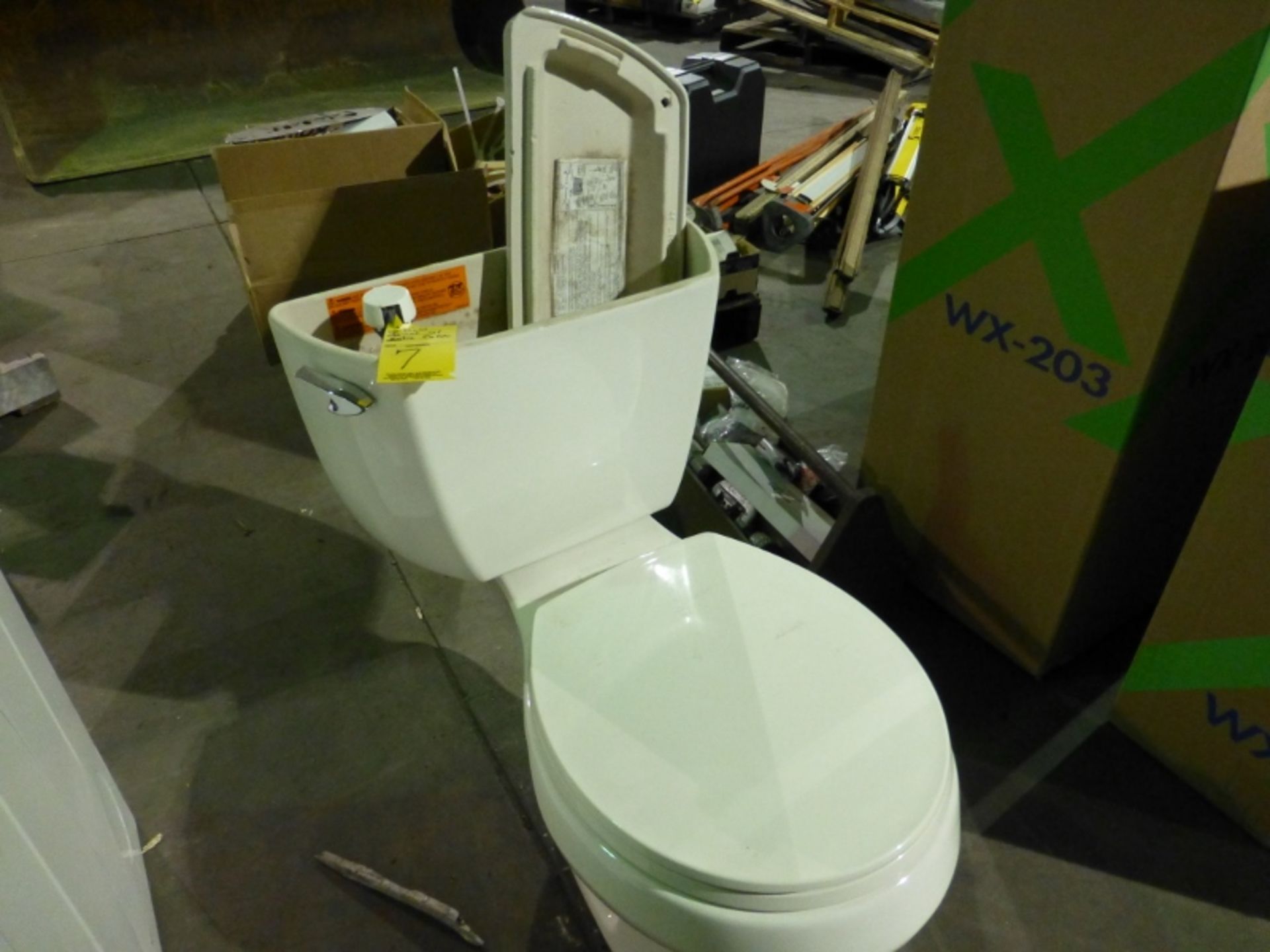 New Kohler 1.6 gal/flush toilet, with extra cover