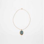 An 18 carat gold pendant with labradorite cameo and pearl on 18 carat gold necklace The