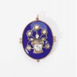 An antique gold and silver pendant with blue enamel and diamonds Circa 1900 The oval pendant