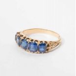 An antique 18 carat gold ring with sapphires England, late 19th century The gold ring set with a