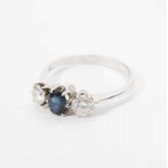 A 14 carat white gold ring with diamond and sapphire Late 20th century The white gold ring set with