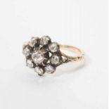 A 14 carat gold and silver ring with diamonds The Netherlands, 20th century The gold ring set with