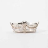 A silver Louis XVI-style bread basket Circa 1900, marked with Dutch rampant lion The oval basket on
