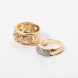 Two various 18 carat gold rings with diamonds Late 20th century A wide openwork gold ring partly