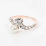 An 18 carat gold and platinum Belle Époque ring with diamonds and pearl Circa 1910 The gold and