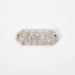 A platinum Art Deco plaque brooch with diamonds Circa 1920 The rectangular brooch set with three