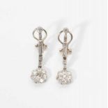 A pair of 14 carat white gold Art Deco ear clips with diamonds Circa 1925 The white gold earrings