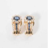 A pair of 14 carat gold ear studs with diamonds and sapphires Late 20th century The ear studs set