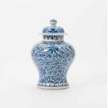 A Chinese blue and white 'lotus' vase and cover 19th century The baluster sides decorated with a