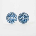 A pair of deep Chinese blue and white plates Kangxi period (1662-1722) Both decorated with a monk