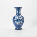 A Chinese blue and white and powder-blue baluster vase 19th century Decorated with panels enclosing