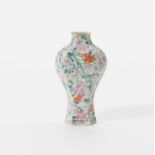 A small Chinese famille rose millefleurs vase Early 20th century The hexagonal baluster vase