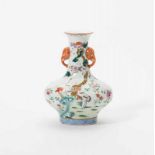 A Chinese famille rose vase 20th century Decorated with cranes and bats near a pine tree,