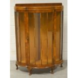 A 20th century astragal glazed walnut veneered display cabinet, raised on pad feet, width 91cm.