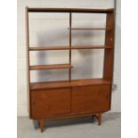 A mid-20th century teak bookcase,