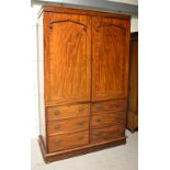 A late Victorian mahogany converted linen press,