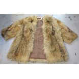 A vintage fox fur jacket with interior label for 'William Creamer & Co Liverpool'.