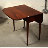 A contemporary inlaid mahogany drop-leaf Pembroke table on tapering legs and castors,