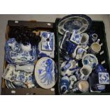 Two boxes of mainly blue and white ceramics to include ornamental elephants, ornamental ducks,