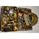 A quantity of metalware to include copper kettles, horse brasses, brass trays, a copper mould etc.