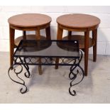 A pair of small round occasional tables, each with lower tier on square section tapering legs,