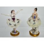 A near pair of Capodimonte ballerinas in lace tutus, both raised on gilt-heightened plinth bases,