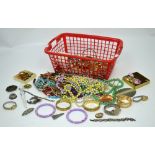 A quantity of costume jewellery to include necklaces, rings, brooches etc.