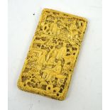 A 19th century heavily carved two-section Canton ivory card case with profuse carving of figures