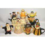 A quantity of novelty teapots to include examples modelled as Queen Elizabeth I, a jester,