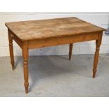 A rustic pine country kitchen table with cutlery drawer, width 122cm.