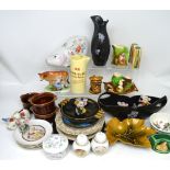 A collectors' lot of decorative 20th century ceramics to include money banks,