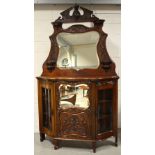 A Continental Art Nouveau style walnut credenza with mirrored upstand,