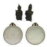 A pair of early 20th century bronze figural match strikers with hinged heads,