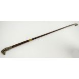 A late 19th century Continental riding crop with electroplated horse head handle and string work