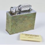 A c 1930's McMurdo chrome and shagreen covered table lighter, length 7.5cm.