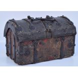 A rare 15th/16th century iron clad and leather bound dome topped casket with central loop carrying