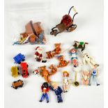 A quantity of diecast and cold painted miniature Hantel pewter figures to include a Raggedy Ann,