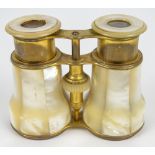 A pair of 19th century brass and mother of pearl opera glasses, height 9.5cm.