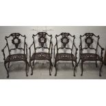 Four ornate painted metal garden chairs (4).