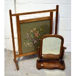 A Victorian mahogany swing mirror and an Edwardian tapestry fire screen (2).