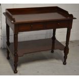 A Victorian mahogany two-drawer side table with three-sided gallery above two short drawers,