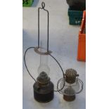 An Edwardian metal adjustable standard lamp with octagonal clear glass shade and two vintage metal