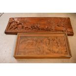 Two heavily carved hardwood panels, both depicting agricultural scenes, width of largest 120cm,