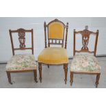 A Victorian walnut hall chair with padded back,